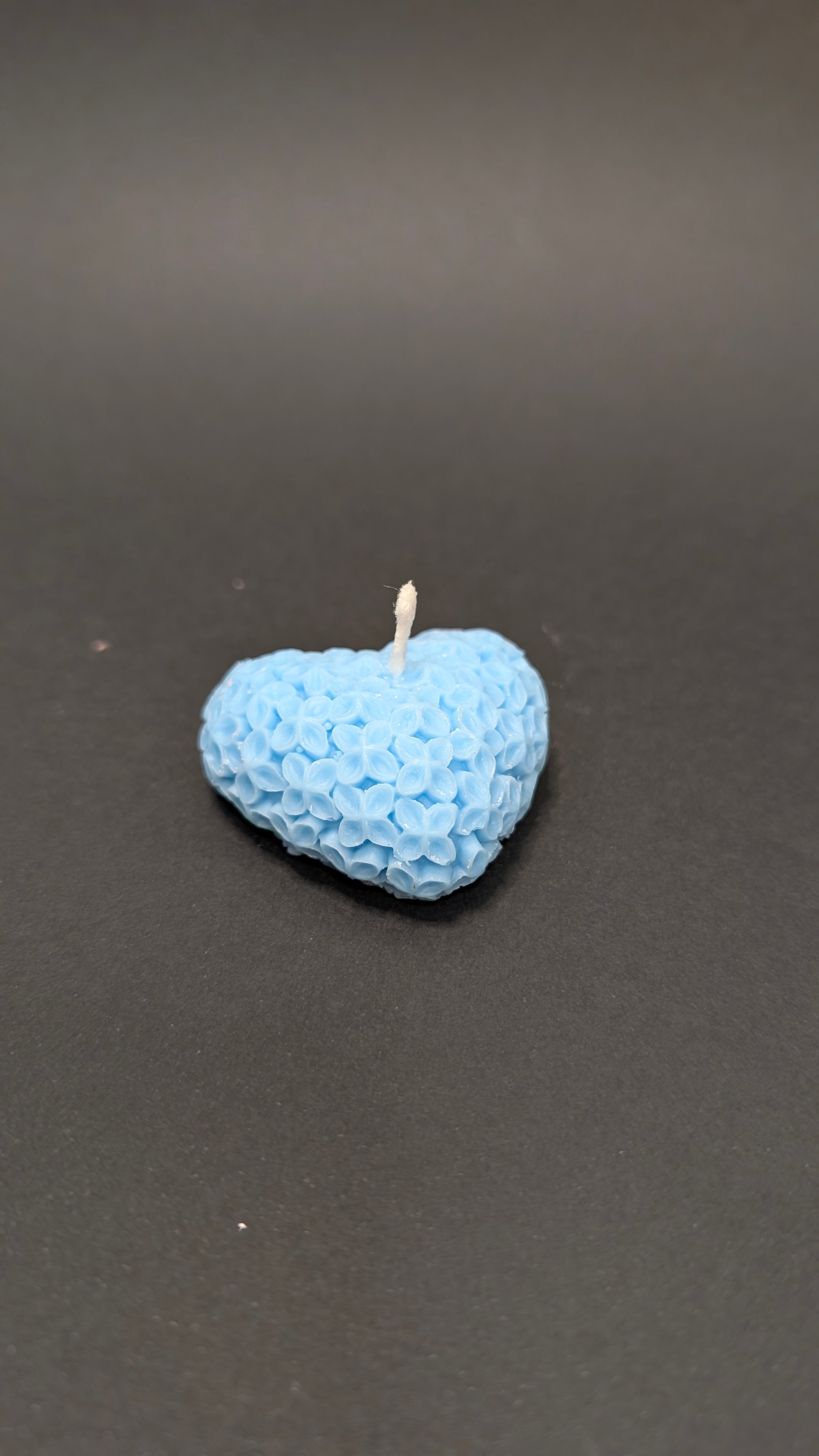 Vela decorativa corazón floral